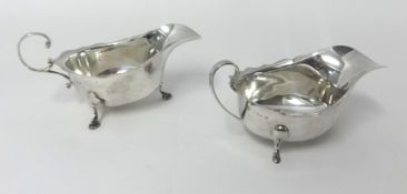 A silver sauce boat, Birmingham 1930, with a wavy border, another similar 1932, weight 5.5 oz.