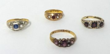 A Victorian 15ct gold almandine garnet and half pearl dress ring, a sapphire and diamond three stone
