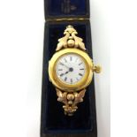 An 18ct gold manual wind ladies wristwatch, circa 1910/20, the white enamel with black Roman