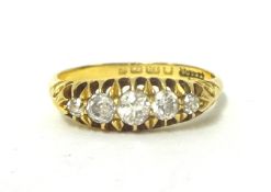 An Edwardian 18ct gold and diamond five stone ring, Birmingham 1905, claw set with graduated old cut