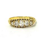 An Edwardian 18ct gold and diamond five stone ring, Birmingham 1905, claw set with graduated old cut