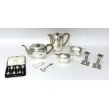 An electroplated four piece tea and coffee service, together with a pair of silver sugar tongs, a