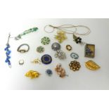 A 9ct gold and CZ three stone ring and various costume jewellery.