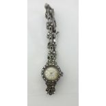 Accurist A ladies silver and marcasite set wristwatch, with a Y section bracelet.