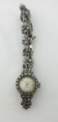 Accurist A ladies silver and marcasite set wristwatch, with a Y section bracelet.