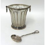 A Willian IV silver sugar basket, London 1830, of wire form with a gadrooned border, two ring