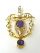 A Victorian gold, amethyst and pearl pendant of openwork scroll design, with a milligrain collet set