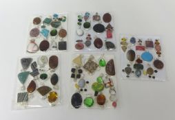 58 various silver mounted pendants, set with hardstones, semi-precious stones and paste stones.