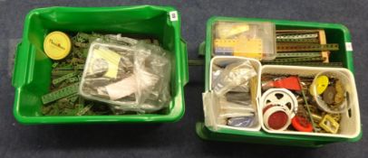 A large quantity of various Meccano parts in two boxes.