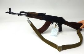 Deactivated; a Soviet Kalashnikov AKM assault rifle, number 718746, calibre 7.62mm, dated 1975, with