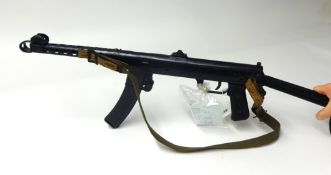 Deactivated; a Soviet PPS43 sub-machine gun, number 545, calibre 7.62mm, dated 1943, with magazine