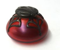 A coloured glass inkwell or scent bottle with Art Nouveau overlay pewter decoration , with