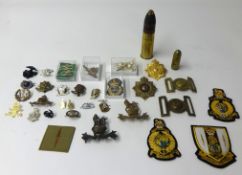 A collection of various original and restrike Cap Badges, Patches etc. Also a WWI pair of medals