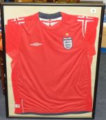 OF FOOTBALL INTEREST England shirt signed Trevor Francis, framed.