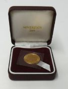 An uncirculated 2001 sovereign, cased.
