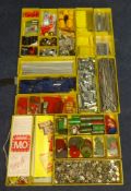 Fifteen yellow metal boxes of various Meccano pieces, clips, tyres, strips, plastic accessories etc.