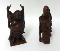 A pair of carved hardwood figures, 24cm.