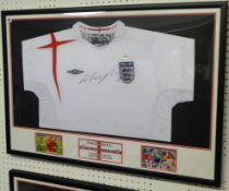 OF FOOTBALL INTEREST England shirt, signed Wayne Rooney, montage display, with certificate.