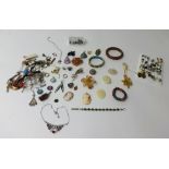 A quantity of mixed jewellery to include; an opal doublet ring, a pair of jet ear rings and two