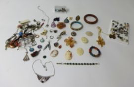 A quantity of mixed jewellery to include; an opal doublet ring, a pair of jet ear rings and two