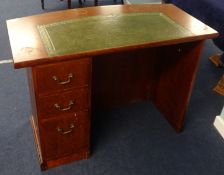 A small office counter desk with leather insert, fitted with drawers on one side, width 107cm.