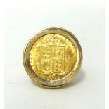 A 9ct gold half sovereign ring, set with a 1892 Old Head shield back coin, weight 9.4 grams.