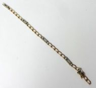 A 9 ct two colour gold curb link bracelet, weight 10.5 grams.