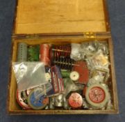 A large wooden chest of Meccano parts.