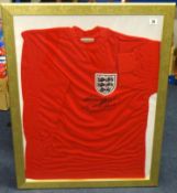 OF FOOTBALL INTEREST England shirt signed Geoff Hurst.