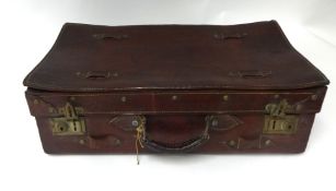 An old Leather suitcase with LNER luggage label.