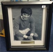 OF FOOTBALL INTEREST A black and white photograph signed George Best in box frame, with