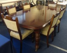 An early 20th century mahogany dining table, with wind out mechanism and one leaf, length 194cm x