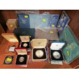 Eight Royal Mint presentation cases of decimal currency, two cased silver one pound coins, a