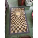 A Masonic carpet in chequerboard pattern (175cm x 290cm approx.)