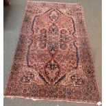 A good quality Keelim style rug of three margins with central medallion on a fawn ground, 124cm x