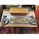 A pair of sectional carved wooden dragons (height 25cm), a heavily carved clock bracket (46cm),