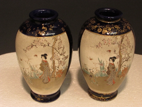 Pair of blue ground ovoid Satsuma vases each with two panels enamelled with figures in landscapes, - Image 2 of 3