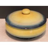 Moorcroft lidded bowl in yellow glaze graduating to blue, diameter 13.5cm, impressed W Moorcroft