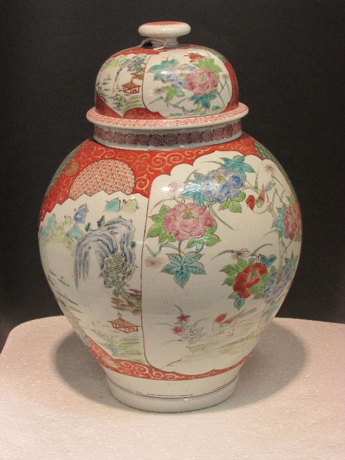 Kutani style baluster vase and cover, painted with panels of flowers and landscapes against scrolled - Image 2 of 3