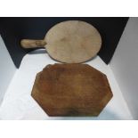 Two breadboards in the style of Robert Mouseman - one oval shaped with handle (38cm x 20cm) and