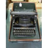 Bijou folding typewriter in fitted case with instruction book no 3017