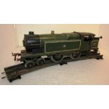 Hornby 0 gauge electric train green GWR 2221, one section of 0 gauge curved track, and a small