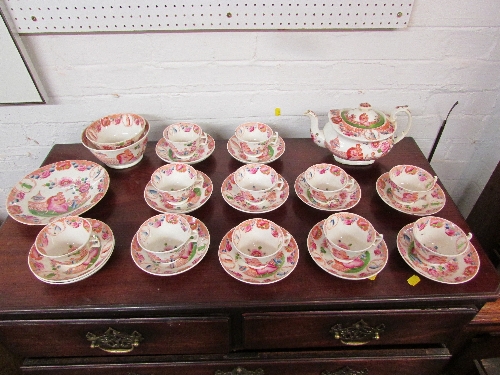 19th century porcelain part tea service comprising teapot, two bowls, eleven cups and twelve