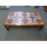Danish teak coffee table by Mobelintarsia topped with eighteen square tiles of square abstract