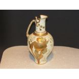 Royal Crown Derby cream ground ewer painted and gilded with iris and flowers, the neck cut in two