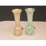 Two Worcester stem shaped vases, the green example with silvered trim, the buff with gilding, the