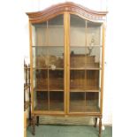 An Edwardian tall inlaid mahogany china display cabinet with arch top, early to mid 20th century