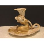Royal Vienna china candle holder modelled as a leaf with female figure bearing the iris-shaped