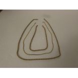 9ct gold rope necklace, length 61cm, 8g; a broken length of yellow metal rope necklace, 5.4g; and