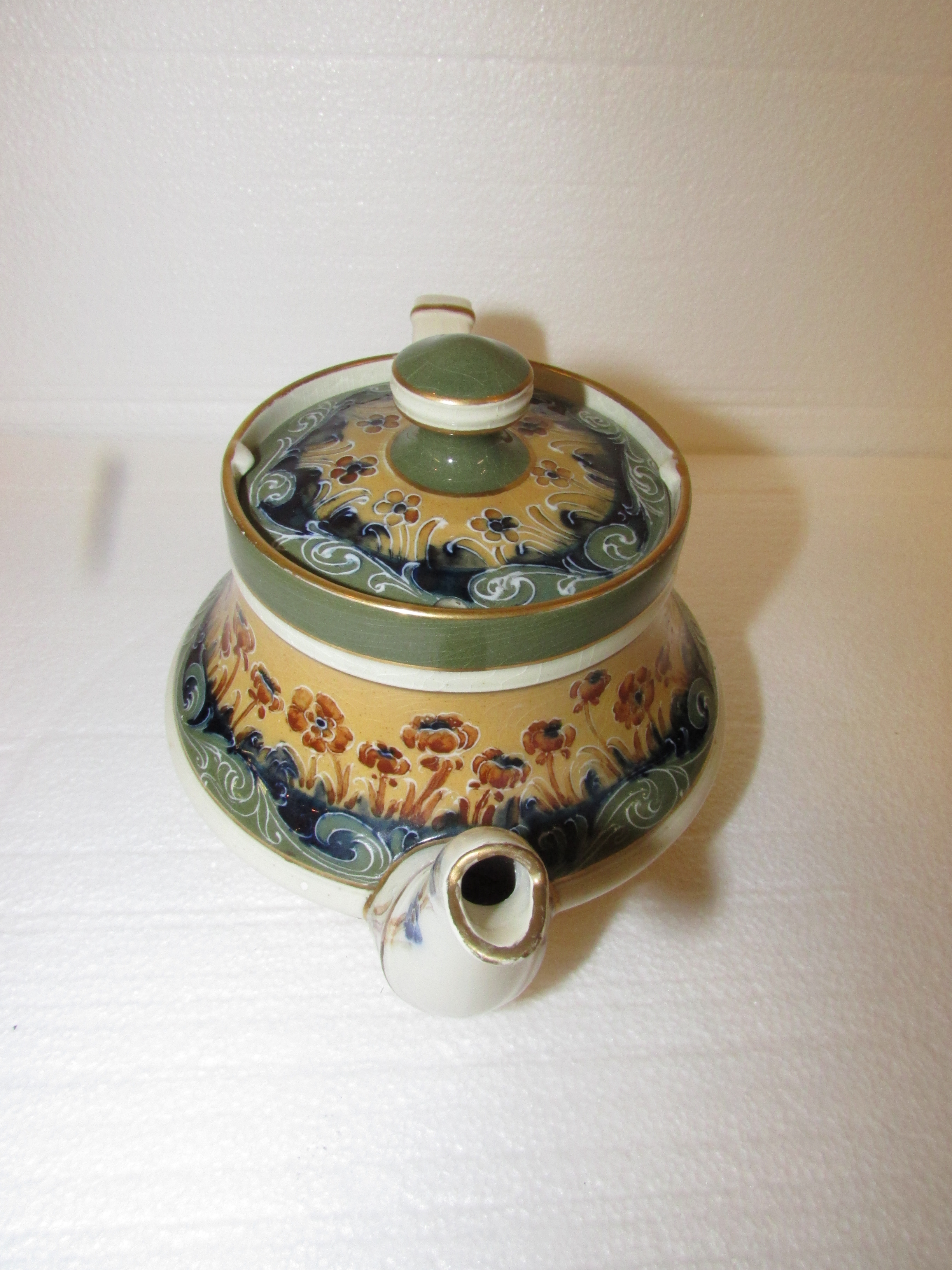 Transitional Macintyre teapot reg no. 401753 decorated with cream and green bands of floral and - Image 2 of 4